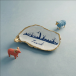 Persoonlijk cadeau: oester met skyline van Texel